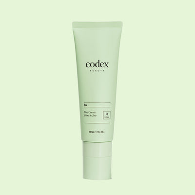 Codex Beauty Bia Day Cream bottle on green background